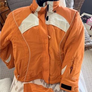 Obermeyer Women's Ski Jacket in Orange and White